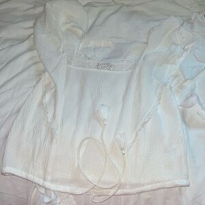 Altar’d state ruffle top